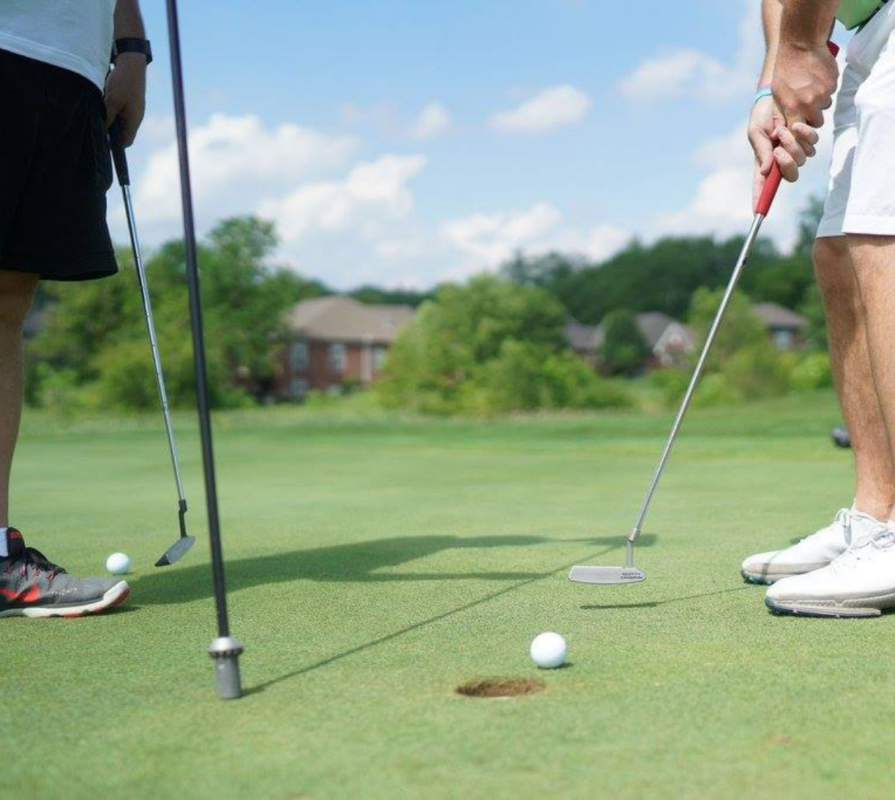 closeup of putting at golf event