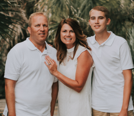 Bo Rowe with his wife and son