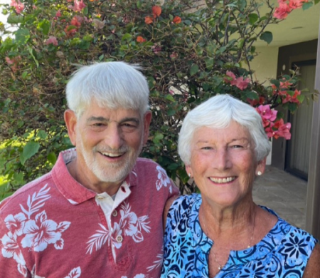 Larry and his wife smiling